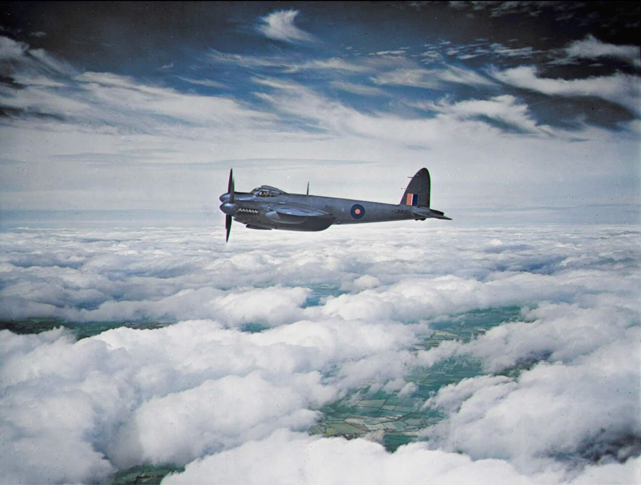 A colourised image of LR412 in flight during 1943, credit Spitfire AA810 Project