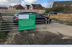 Restriction sign on gates of site