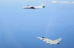 RAF Typhoon (bottom) deployed on Operation AZOTIZE in Estonia intercepts a Russian military transport aircraft (top)