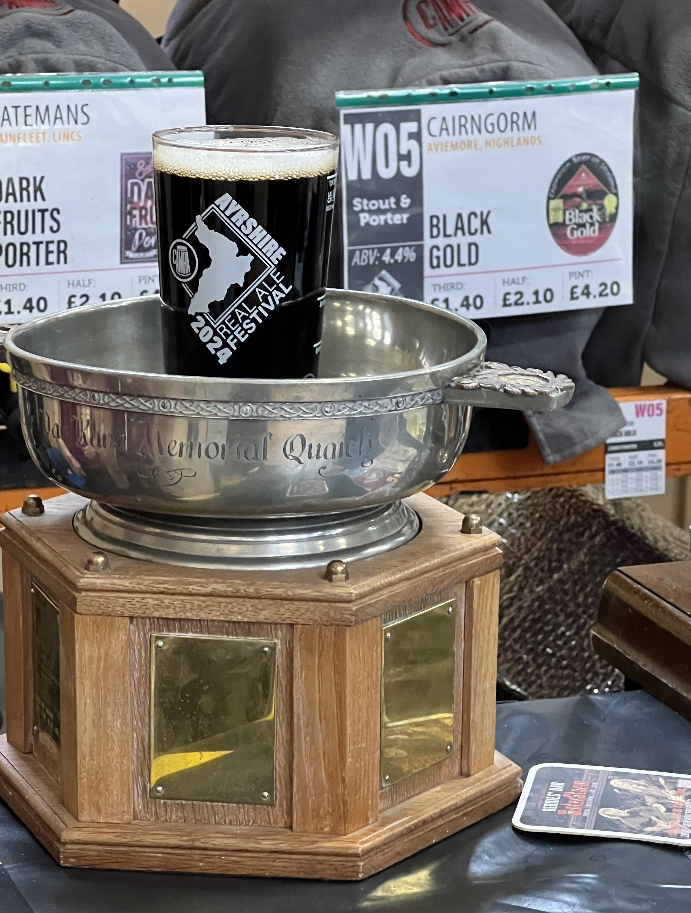 CAMRA’s Scotland Director Stuart McMahon with a pint of the award-winning Black Gold  and the Dan Kane Memorial Trophy