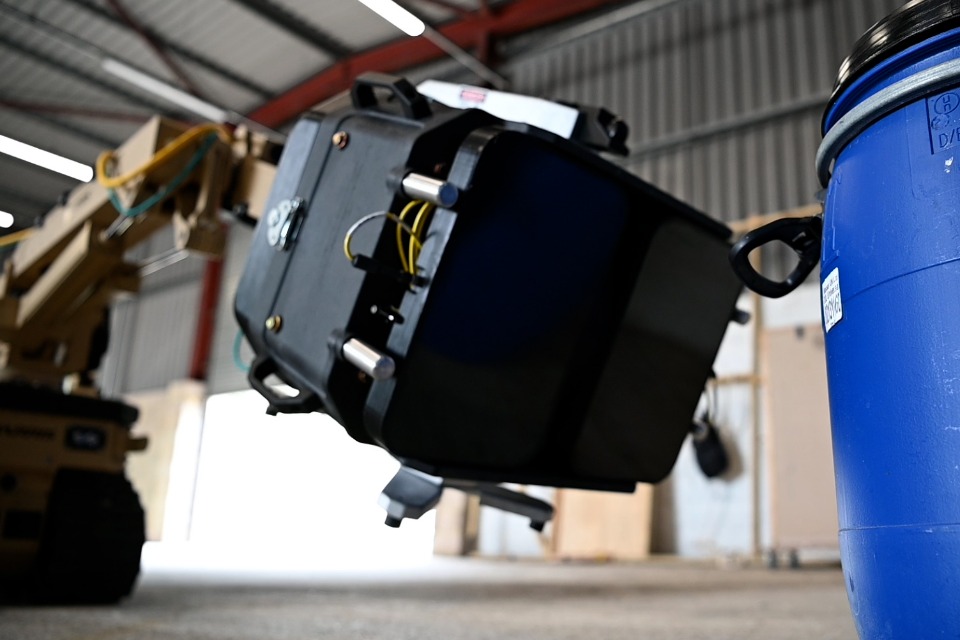 X-ray robot examines the contains of a drum